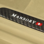 Entrance panels with MANSORY SWITZERLAND logo