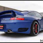 Misha Design Porsche 996 GT2M wing on blue Carrera wide body