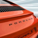 Painted "PORSCHE" logo in Black (high-gloss)